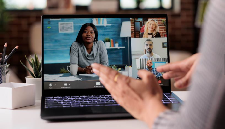Team meeting displayed on laptop screen